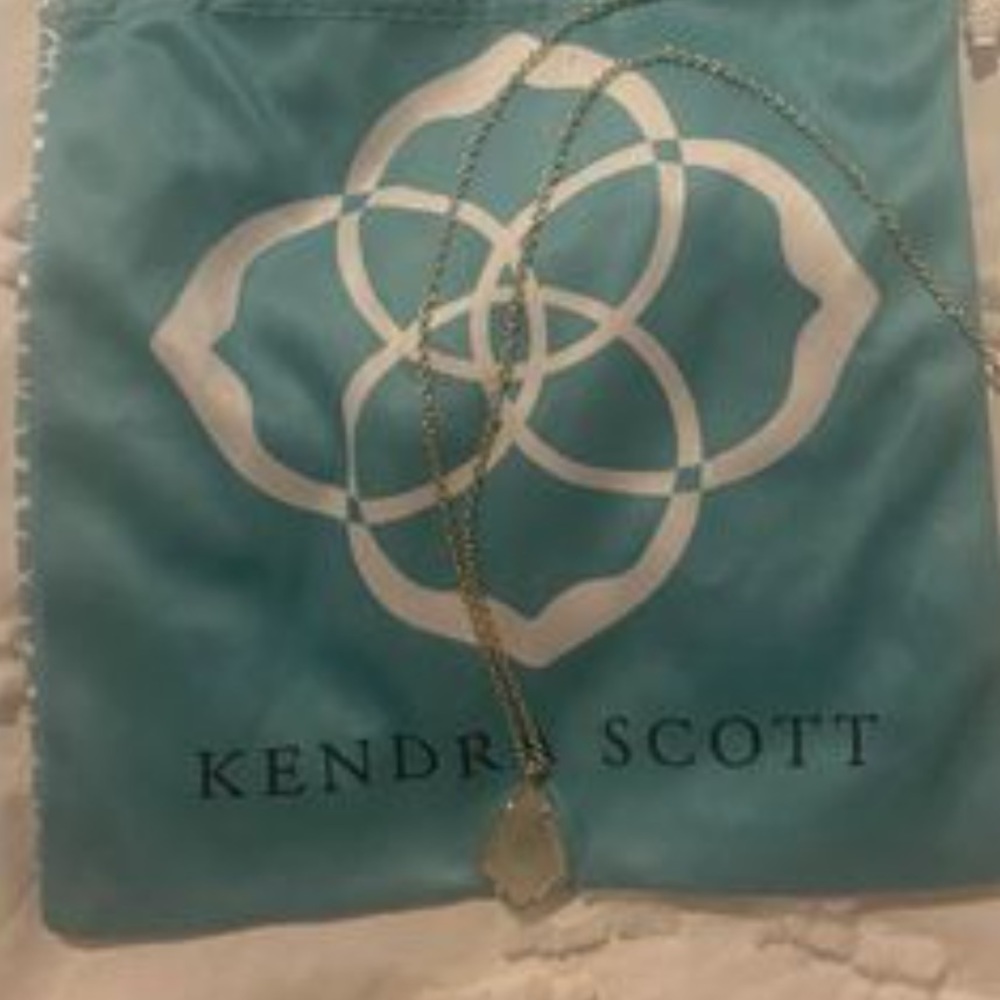 Kendra Scott necklace with light pink stone gold chain